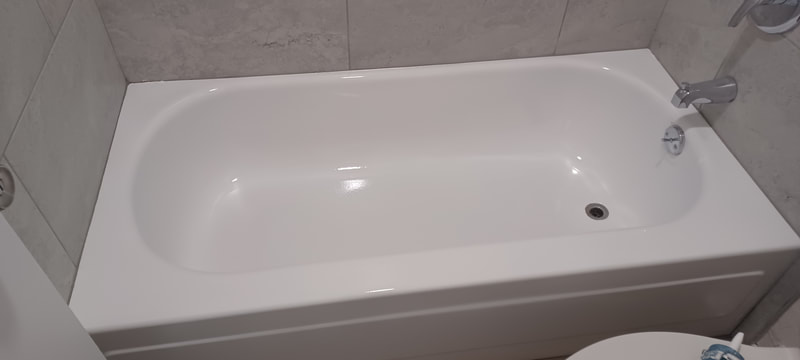 Porcelain bathtub refinishing with fluoropolymer coating. Dallas bathtub refinishing Dallas TX